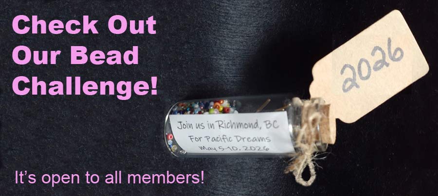 A sign that says, "check out our bead challenge! It's open to all members," to the left of a photo of a tiny bottle with beads inside, a label that says "join us in Richmond, BC," and a tag that reads "2026" tied to the top.