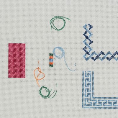 photo of a variety of stitches that are worked over a counted number of threads on an evenly woven fabric