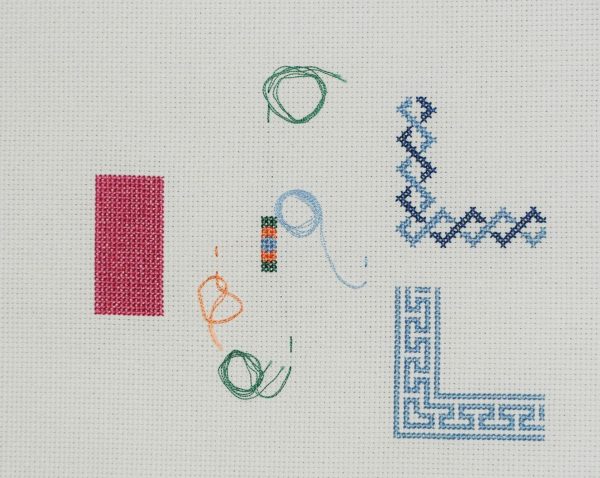 photo of a variety of stitches that are worked over a counted number of threads on an evenly woven fabric