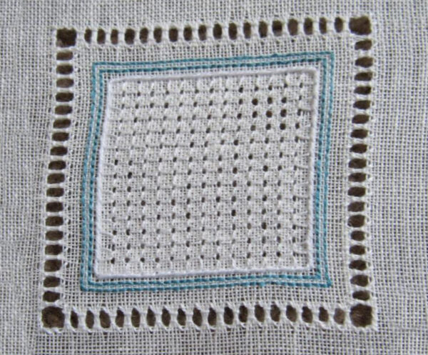 Photo of a square embroidery with a border of open squares made by removing some threads and wrapping others, with a central area of a textured grid made by stitches puling the threads of the fabric intoa pattern of smaller squares with each corner open.