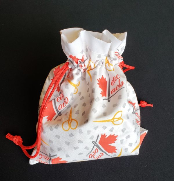 photo of a drawstring bag made with EAC/ACB logo fabric